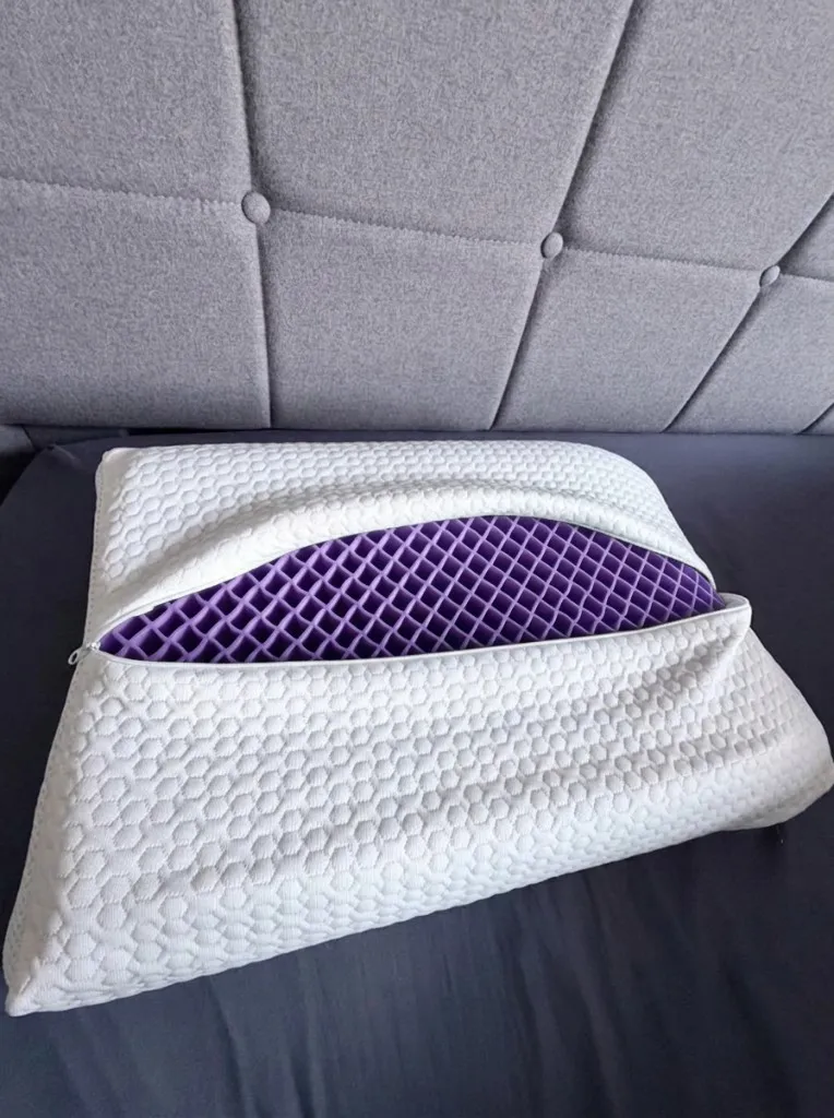 Customer photo of Latticore pillow with the cover unzipped, showing the purple grid